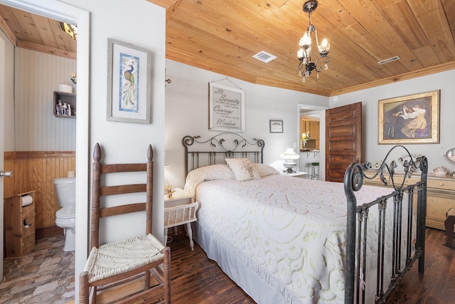 bedroom featuring wood ceiling, ensuite bathroom, crown molding, and dark hardwood / wood-style flooring