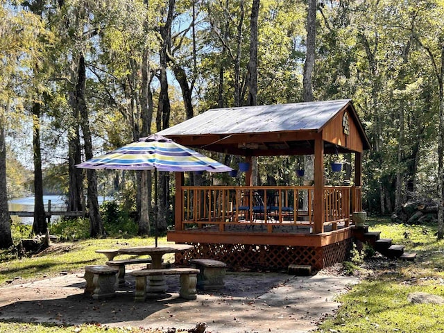 wooden deck featuring a patio area