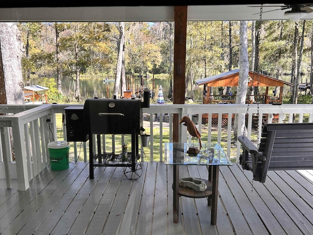 wooden terrace with a gazebo