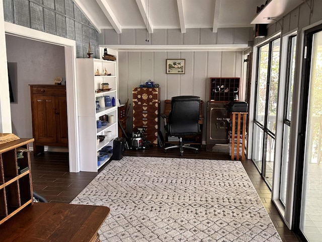 office area featuring dark hardwood / wood-style floors and lofted ceiling with beams