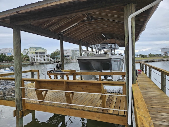 dock area featuring a water view