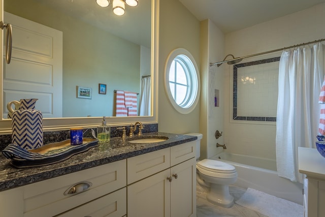 full bathroom featuring vanity, toilet, and shower / bathtub combination with curtain