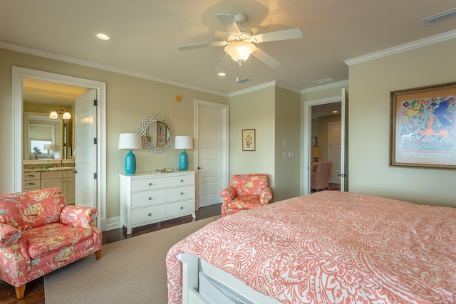 bedroom with sink, crown molding, ensuite bath, dark hardwood / wood-style floors, and ceiling fan