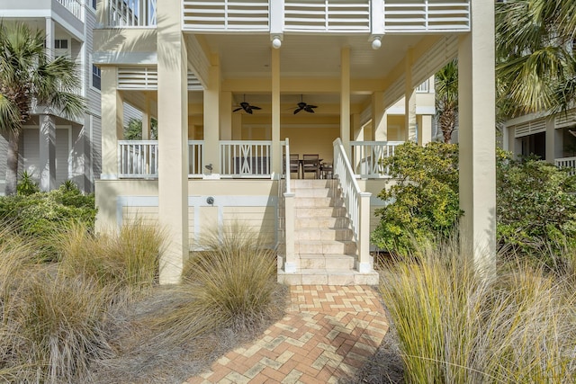 property entrance featuring ceiling fan