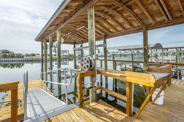 dock area with a water view