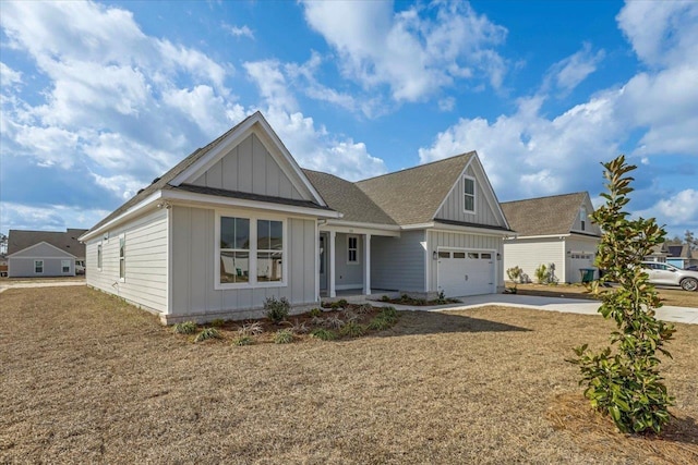 view of front of home featuring a garage and a front lawn