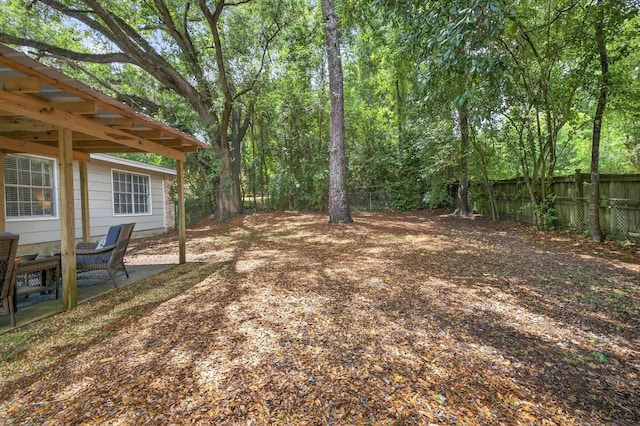 1816 Aaron Rd, Tallahassee, FL 32303 - fenced backyard featuring a patio