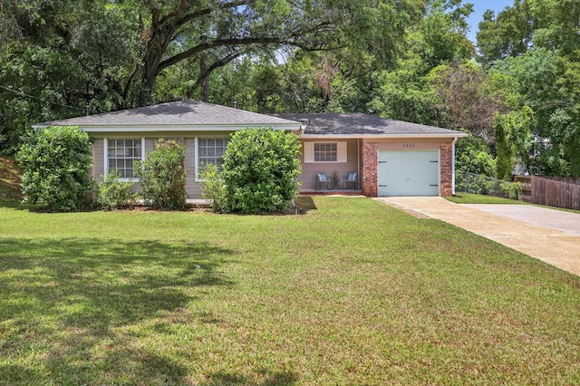 1816 Aaron Rd, Tallahassee, FL 32303 - ranch-style home featuring an attached garage, concrete driveway, and brick siding