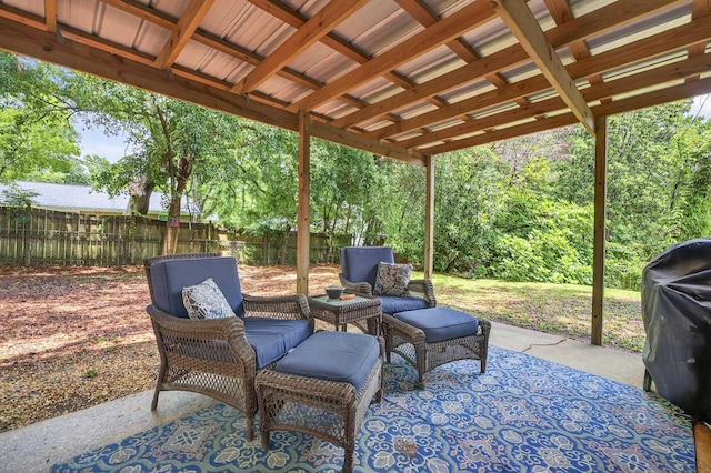 1816 Aaron Rd, Tallahassee, FL 32303 - fenced backyard with a patio, a grill, and outdoor lounge area
