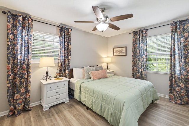 1816 Aaron Rd, Tallahassee, FL 32303 - bedroom featuring multiple windows, light wood finished floors, and ceiling fan