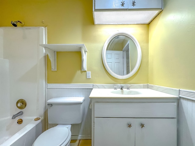 full bathroom featuring vanity, toilet, and washtub / shower combination