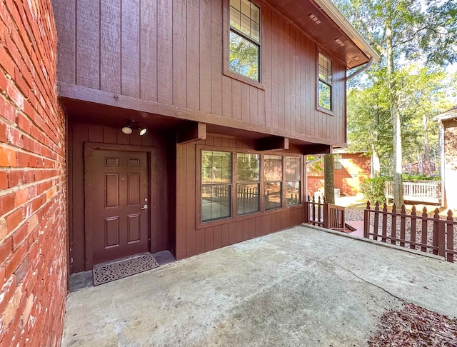 doorway to property with a patio area