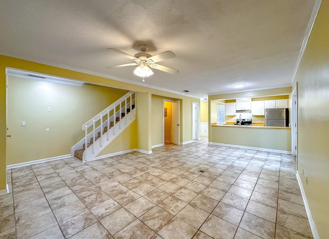 unfurnished living room with a textured ceiling, ceiling fan, and crown molding