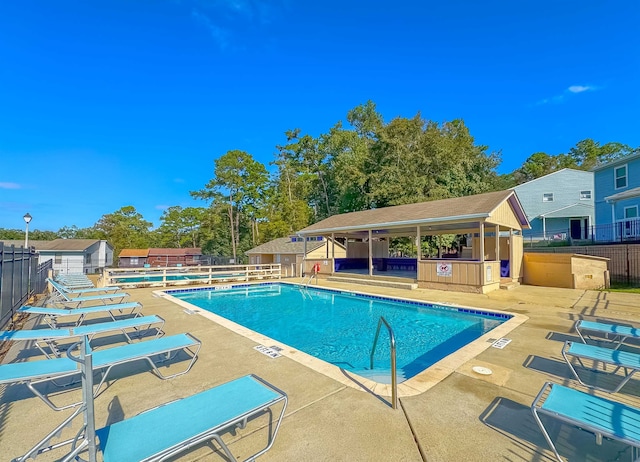 view of pool featuring a patio area