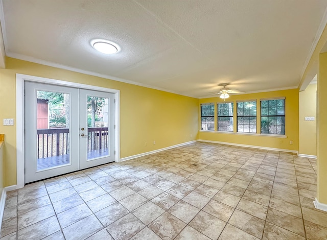 tiled empty room featuring french doors, a textured ceiling, ceiling fan, and ornamental molding