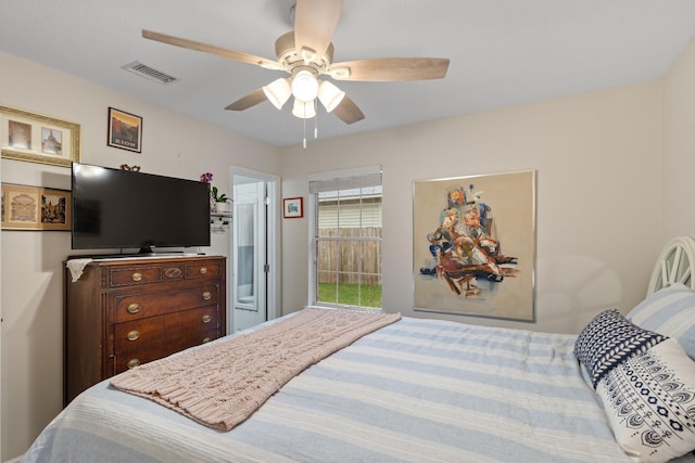 bedroom featuring visible vents and ceiling fan