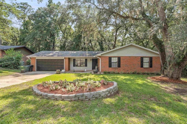 2214 Yaupon Dr, Tallahassee, FL 32303 - single story home with an attached garage, concrete driveway, brick siding, and a front lawn