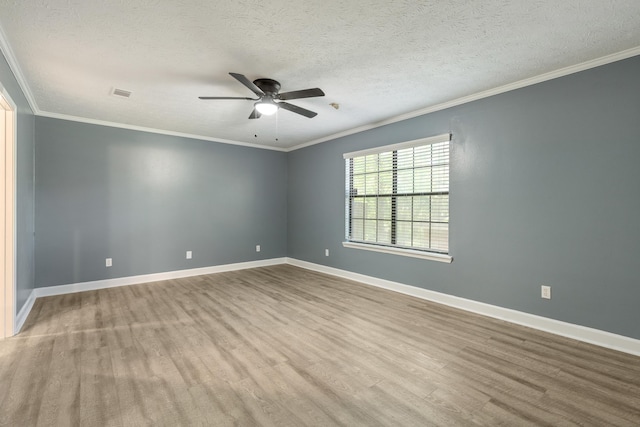 2214 Yaupon Dr, Tallahassee, FL 32303 - empty room featuring wood finished floors, ceiling fan, a textured ceiling, and crown molding