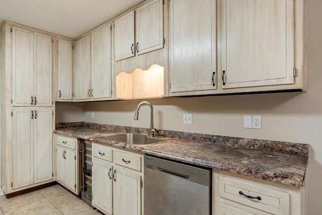 2214 Yaupon Dr, Tallahassee, FL 32303 - kitchen featuring dishwasher, dark countertops, light tile patterned floors, wine cooler, and cream cabinetry