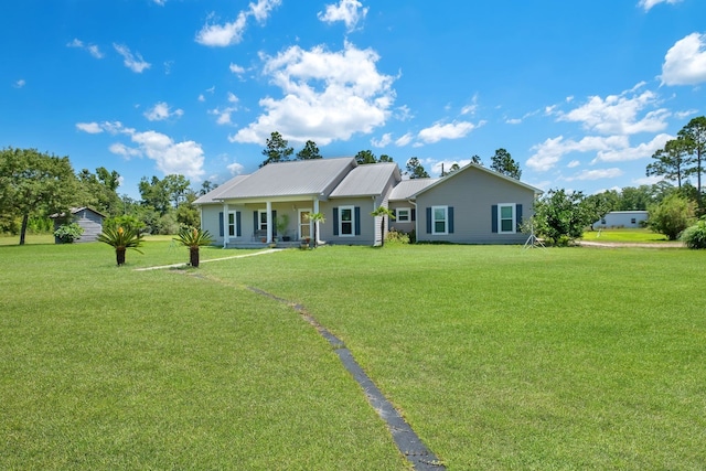 single story home with a front yard and a porch