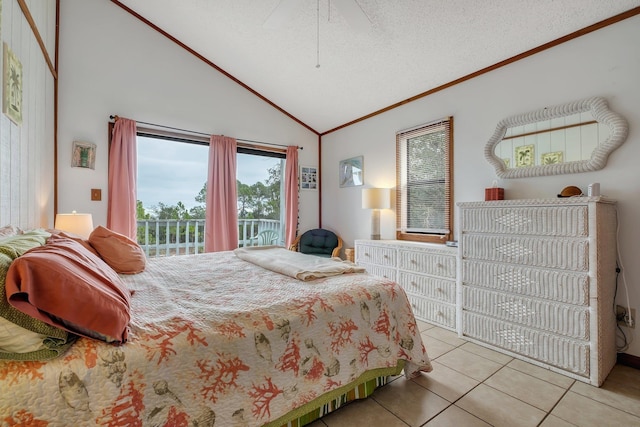 tiled bedroom with crown molding, access to exterior, high vaulted ceiling, and a textured ceiling