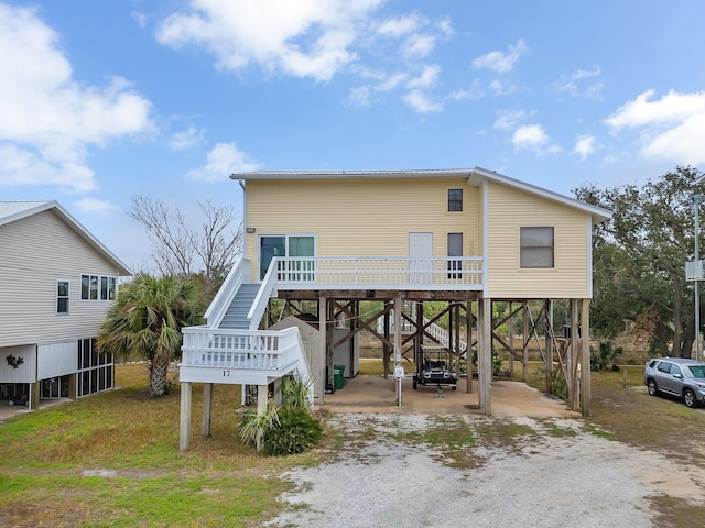 view of front of home featuring a carport