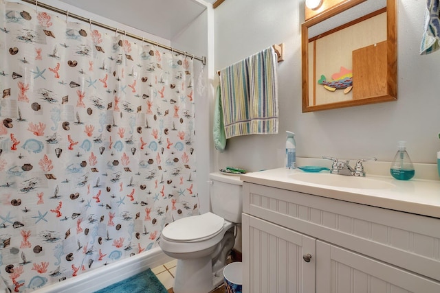 bathroom featuring tile patterned floors, vanity, toilet, and a shower with shower curtain