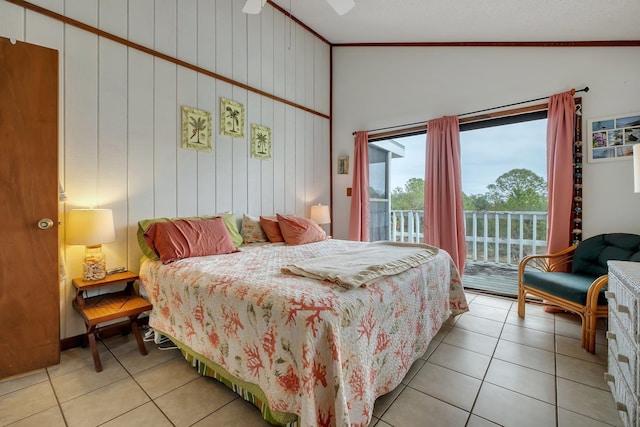 bedroom featuring access to exterior, light tile patterned floors, vaulted ceiling, and ceiling fan