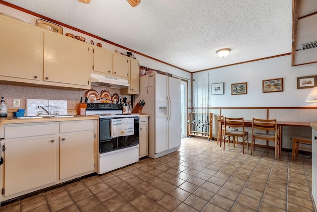 kitchen with crown molding, sink, a textured ceiling, and white appliances