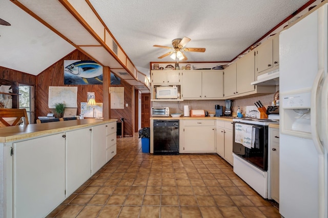 kitchen with white cabinetry, white appliances, wooden walls, and ceiling fan