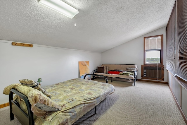 carpeted bedroom with cooling unit, vaulted ceiling, and a textured ceiling