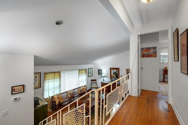 2003 Holly St, Tallahassee, FL 32303 - corridor with hardwood / wood-style floors and an upstairs landing