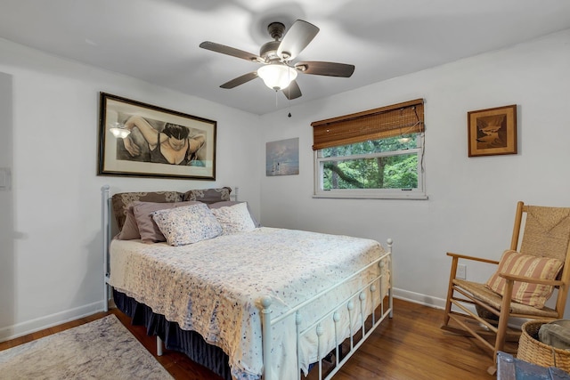 2003 Holly St, Tallahassee, FL 32303 - bedroom with wood finished floors and ceiling fan