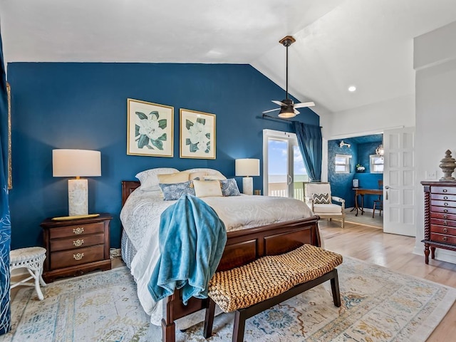 bedroom with vaulted ceiling, wood finished floors, and a ceiling fan