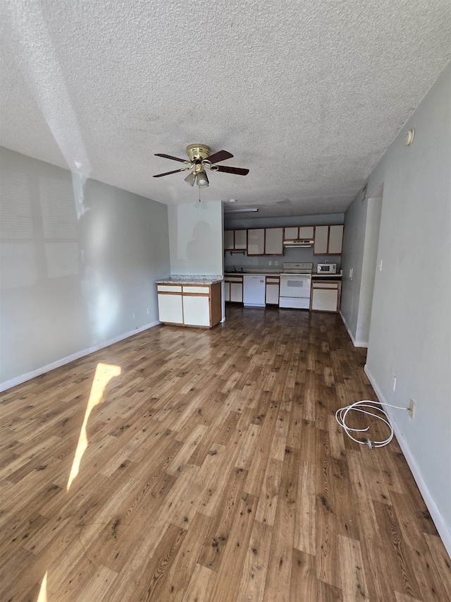 unfurnished living room with hardwood / wood-style flooring, a textured ceiling, and ceiling fan