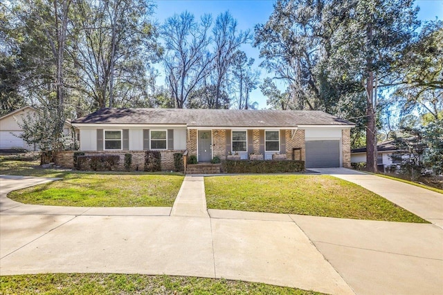 ranch-style home featuring a garage, driveway, brick siding, and a front yard