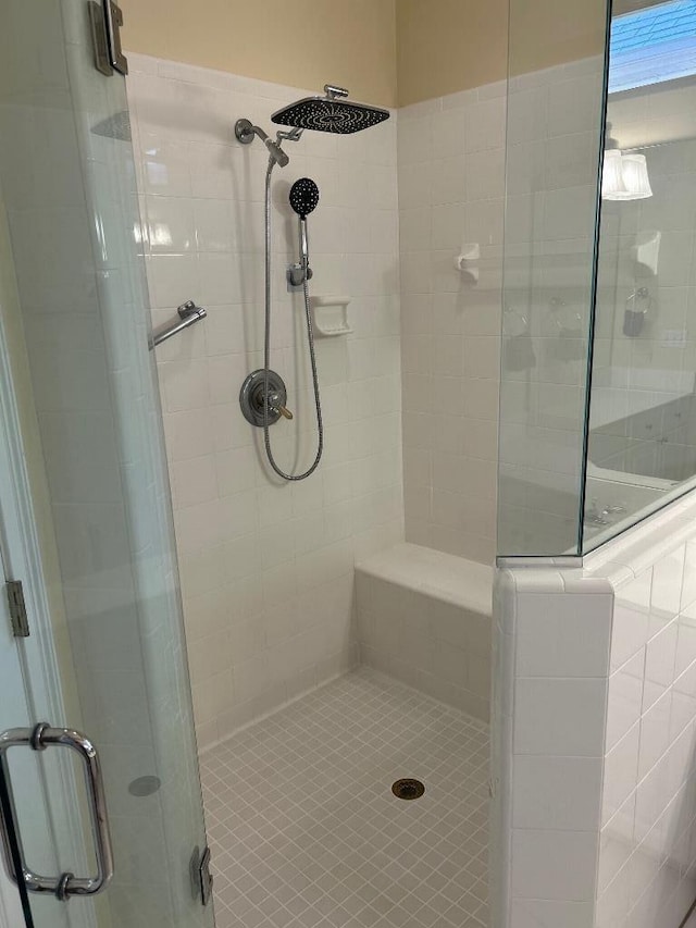 full bathroom with a stall shower