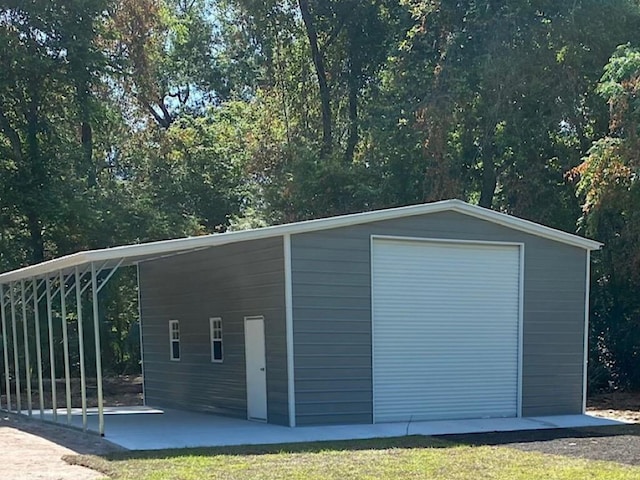 garage featuring a carport