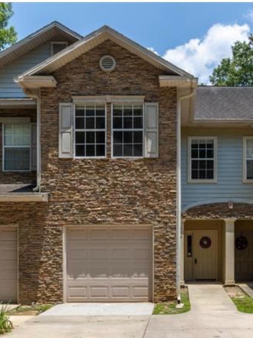 1325 Stone Rd Unit 602, Tallahassee, FL 32303 - view of front of property featuring concrete driveway and an attached garage