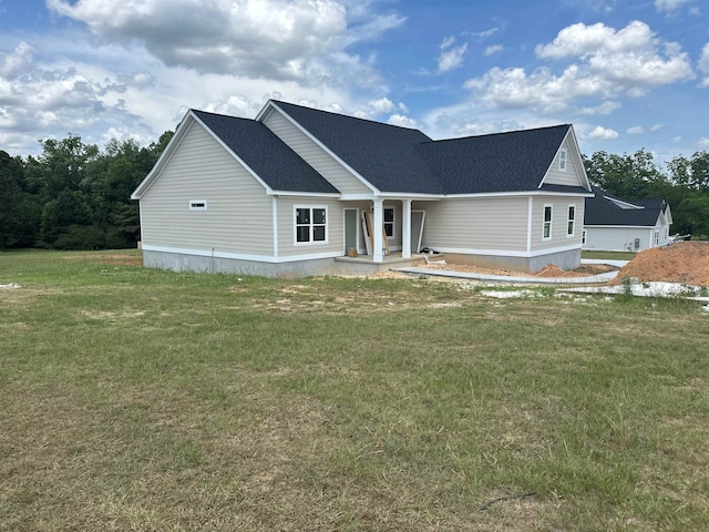 158 Woodridge Ln, Cairo, GA 39827 - view of front of home with a porch, a front yard, and roof with shingles