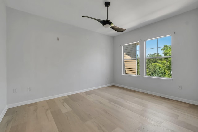 2801 Chancellorsville Dr Unit 236, Tallahassee, FL 32312 - unfurnished room with light wood-style flooring, a ceiling fan, and baseboards