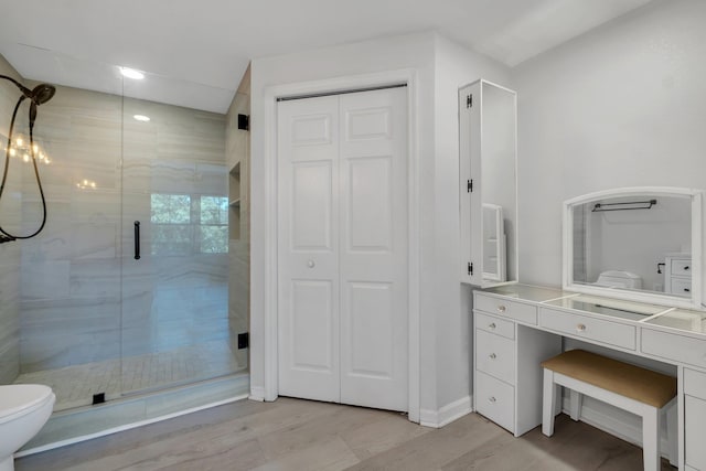2801 Chancellorsville Dr Unit 236, Tallahassee, FL 32312 - bathroom with toilet, a shower stall, a closet, vanity, and recessed lighting