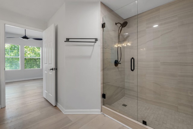 2801 Chancellorsville Dr Unit 236, Tallahassee, FL 32312 - full bath with a stall shower, wood finished floors, baseboards, and ceiling fan