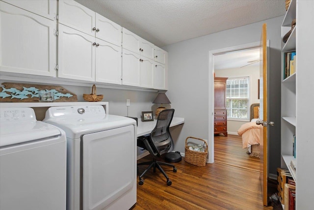 40 Carrol Dr, Crawfordville, FL 32327 - clothes washing area featuring cabinet space, independent washer and dryer, wood finished floors, a desk, and baseboards