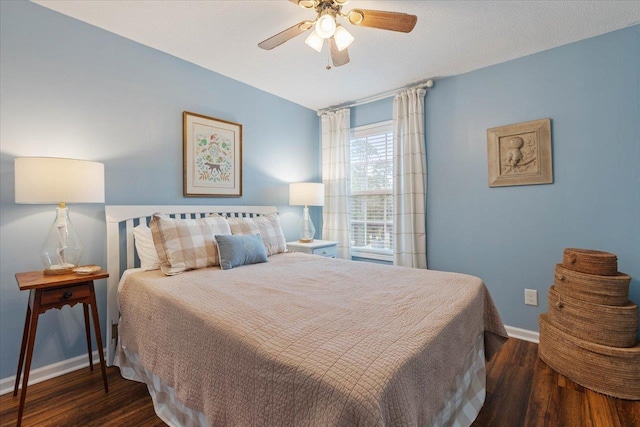 40 Carrol Dr, Crawfordville, FL 32327 - bedroom with wood finished floors, baseboards, and a ceiling fan