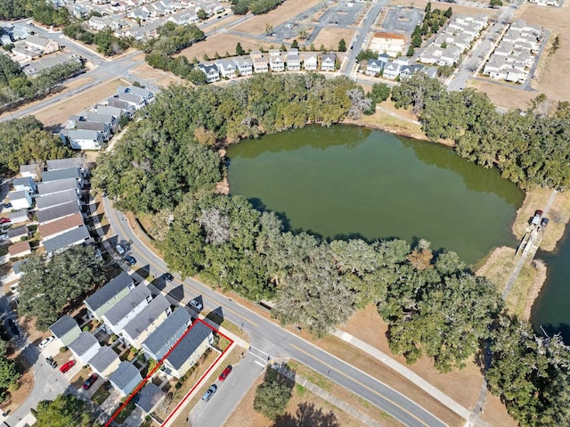 bird's eye view with a water view