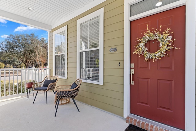 property entrance with a porch