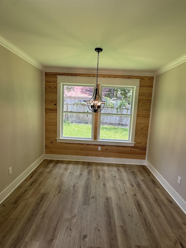 75 Chickat Trl, Crawfordville, FL 32327 - unfurnished dining area featuring a chandelier, crown molding, and wood finished floors