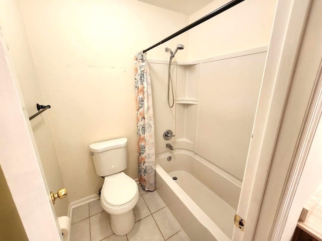 2405 Lanrell Dr, Tallahassee, FL 32303 - bathroom featuring tile patterned floors, toilet, and shower / bath combo