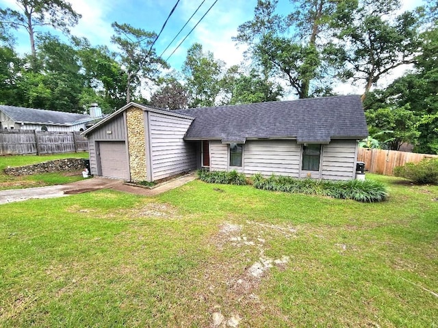2405 Lanrell Dr, Tallahassee, FL 32303 - view of front of house featuring driveway and a shingled roof